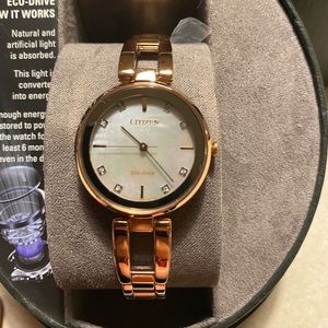 Women’s citizen eco drive EM0803-55D watch -no box
